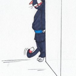 High visibility orange tabby in ninja garb skulking around a corner