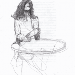 Toothy monster (with no other facial features) with fluffy hair, no hands, and a floral blouse sits at a table